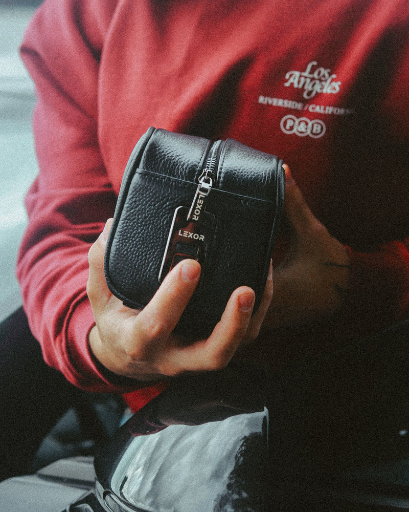 LEXOR travel bag carried at the waterfront